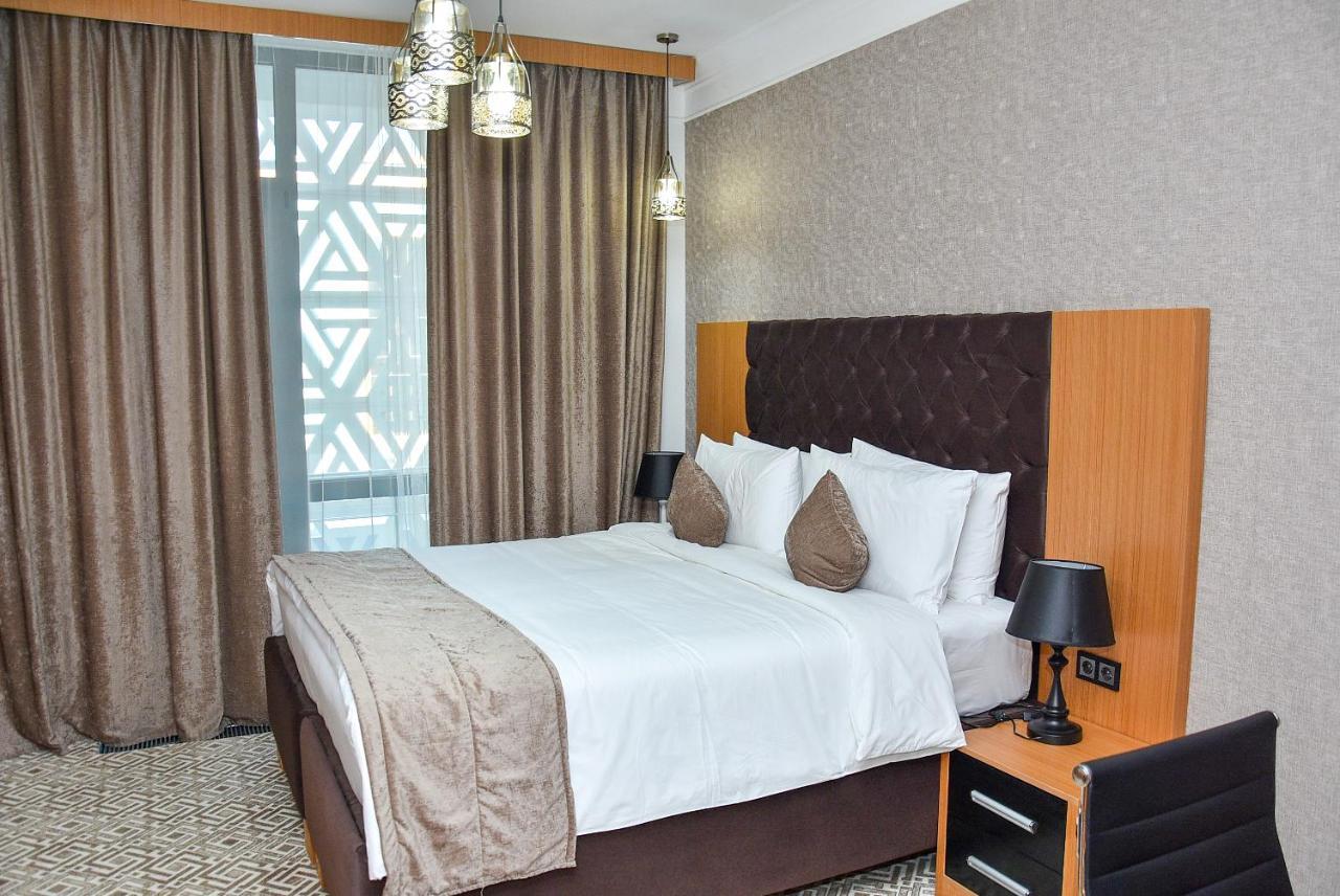 Hotel Ramada By Wyndham Turkistan Exterior foto